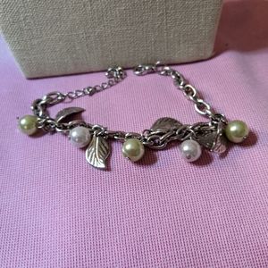 Vintage Faux Pearls Resting on Silver Tone Leaf Bracelet